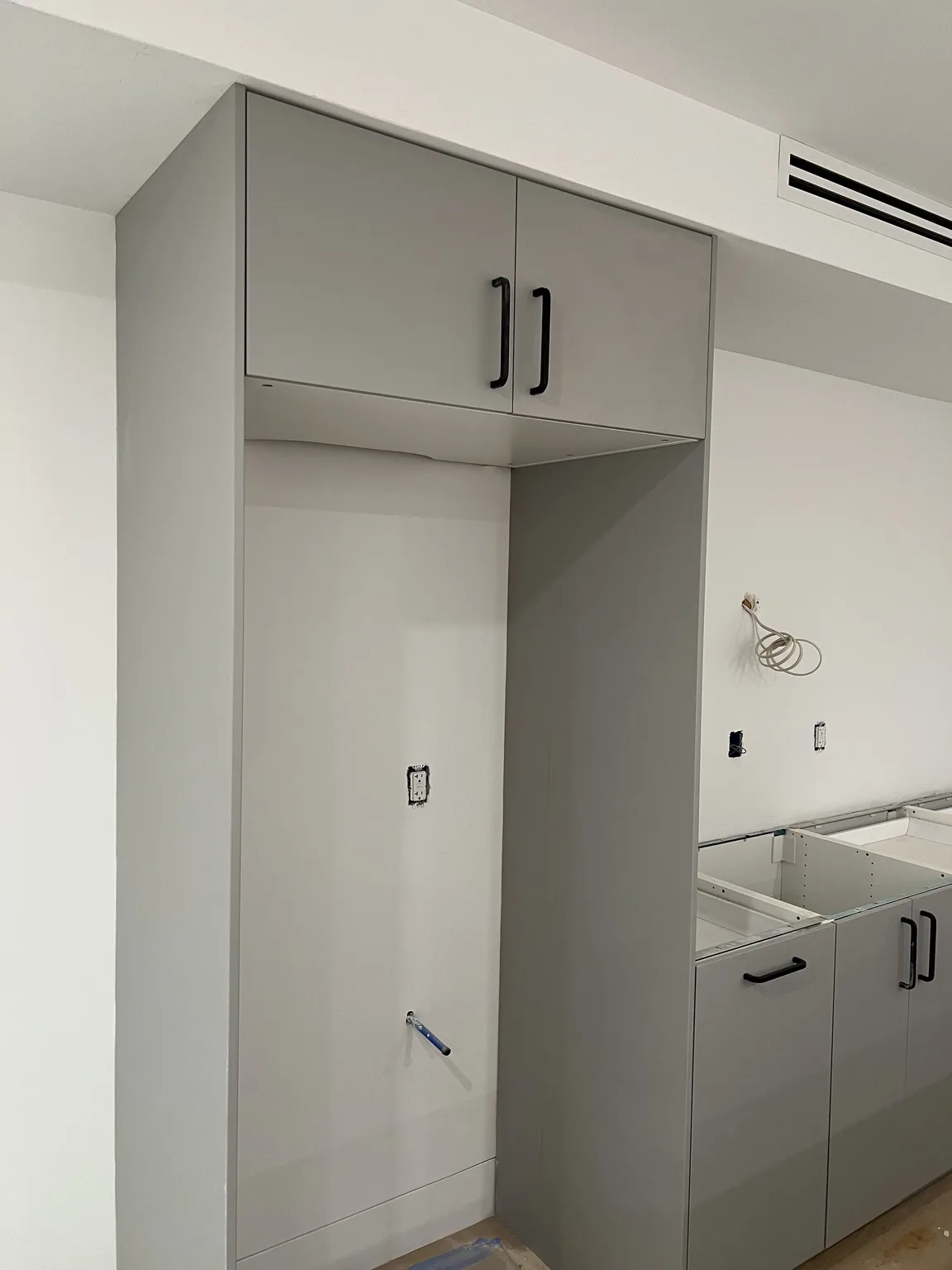 Grey Base Cabinet Installation — Cabinet Assembly by Kitchen Installers