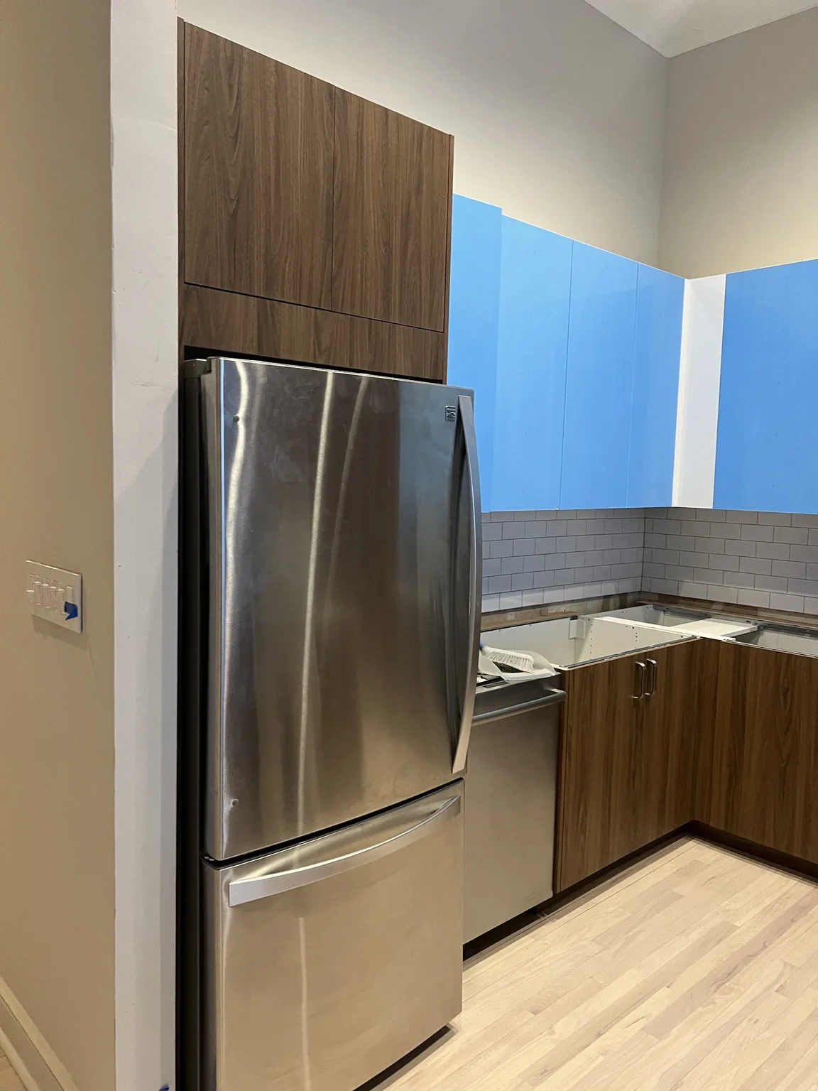 IKEA kitchen installation near Elizabeth, NJ — Walnut Cabinets with Blue Countertop