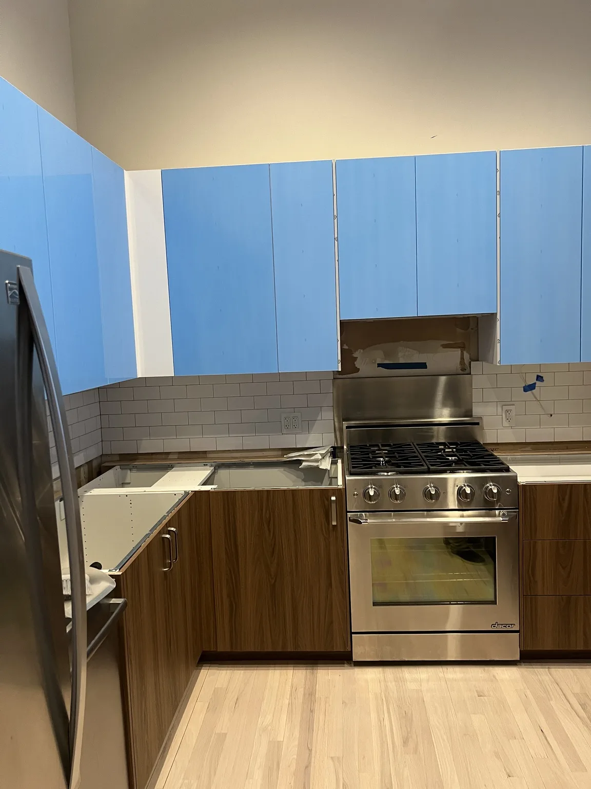 Walnut Cabinets with Blue Countertop