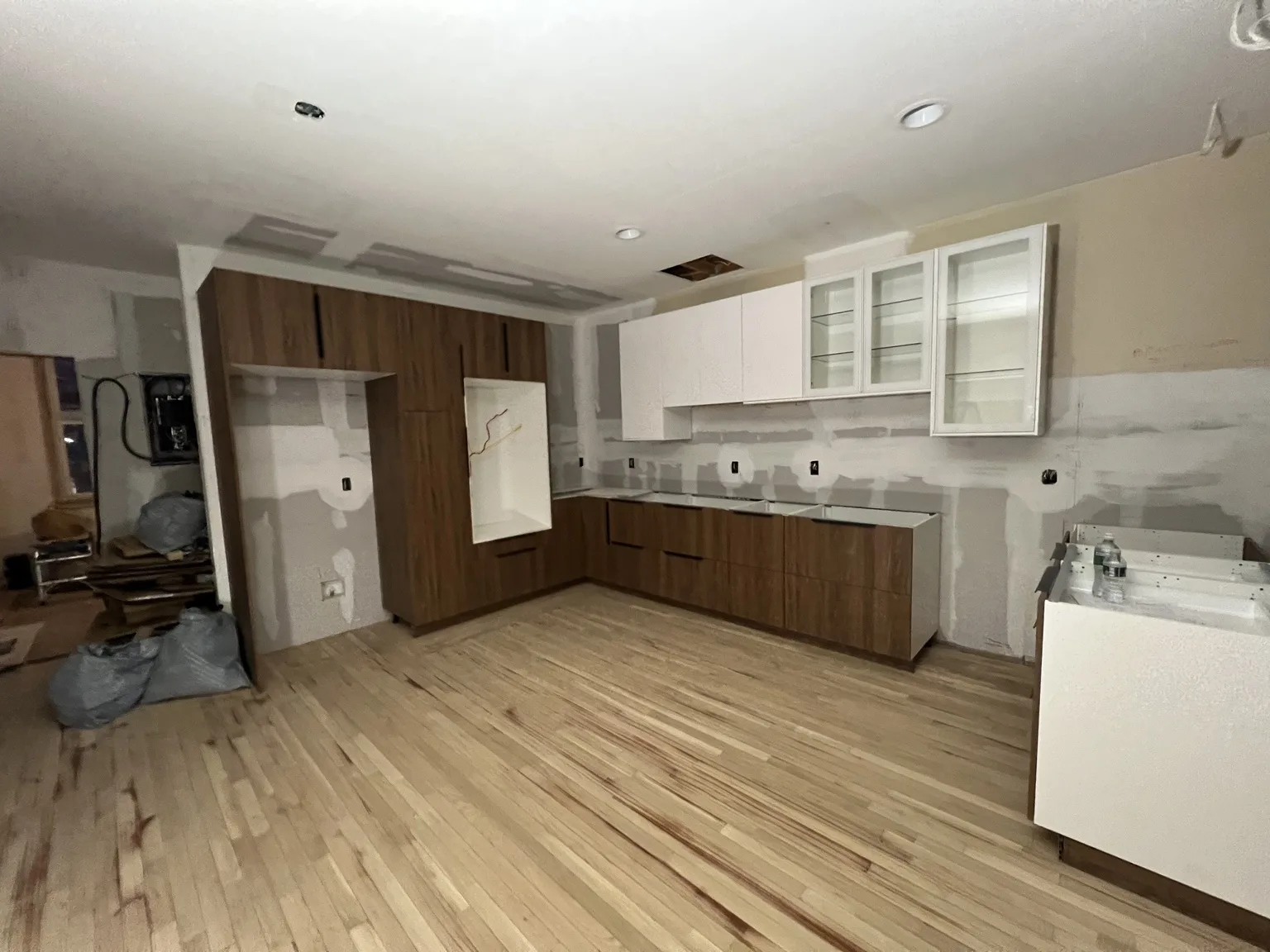 White Cabinets with Glass Doors — Cabinet Assembly by Kitchen Installers