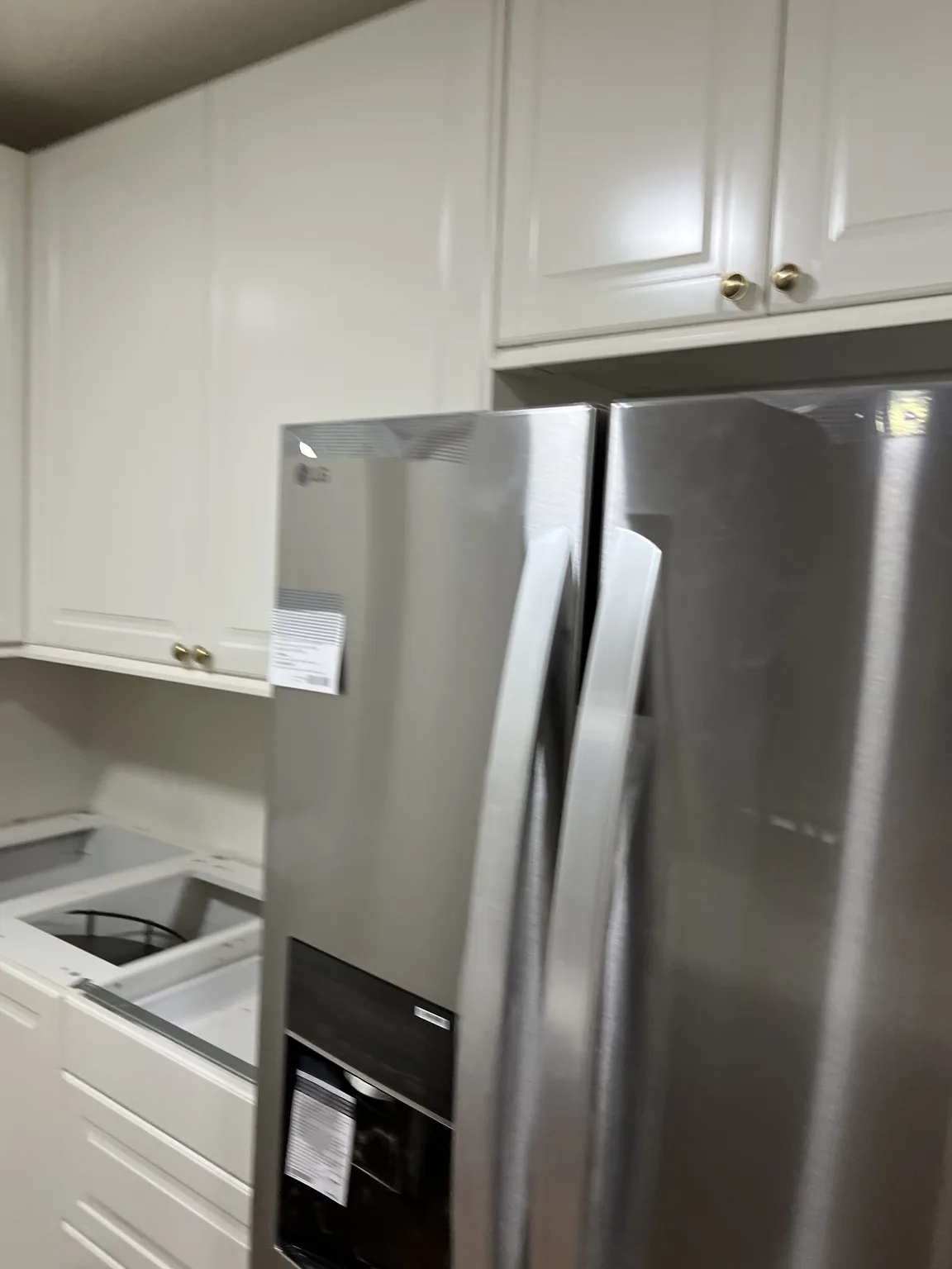White Kitchen with Stainless Range